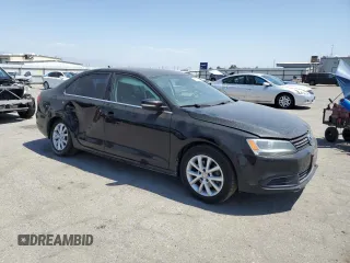 2014 Volkswagen Jetta SE with VIN 3VWD17AJ0EM268515, listed as a Copart auction lot 59977225 with 163,365 mi miles and Salvage title. Bid and sale history available at DreamBid. Image 4.