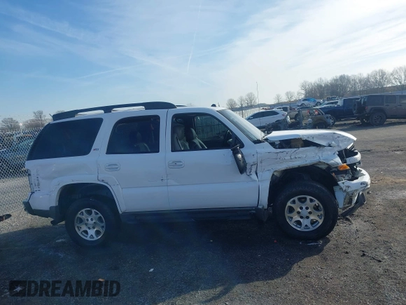 2005 Chevrolet Tahoe Z71 z VIN 1GNEK13T55R268077, wystawiony jako IAAI lot #41442024 z przebiegiem 205 176 mil mil oraz . Historia ofert i sprzedaży dostępna na DreamBid. Obrazek 13.