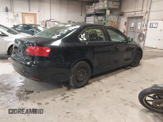 2014 Volkswagen Jetta Sedan S with VIN 3VW1K7AJ7EM445531, listed as a IAAI auction lot 41570775 with 101,522 mi miles. Bid and sale history available at carsss.com. Image 4.