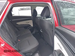2022 Hyundai Tucson SEL with VIN 5NMJF3AE2NH115088, listed as a IAAI auction lot 41915800 with 13,120 mi miles and . Bid and sale history available at DreamBid. Image 8.