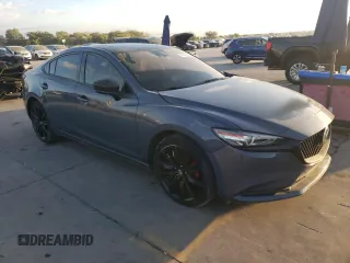 2021 Mazda 6 Grand Touring Reserve with VIN JM1GL1WY7M1602094, listed as a Copart auction lot 77470994 with 15,214 mi miles and Salvage Title. Bid and sale history available at DreamBid. Image 4.