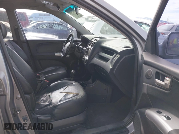 2005 Kia Sportage LX with VIN KNDJE723157089856, listed as a IAAI auction lot 41826630 with 200,380 mi miles and . Bid and sale history available at carsss.com. Image 5.