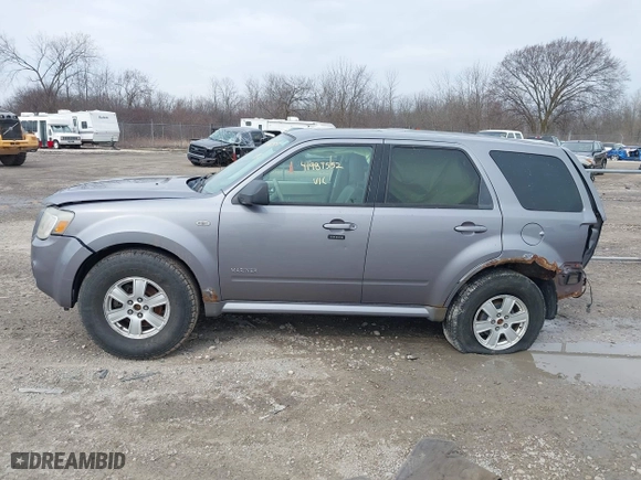 2008 Mercury Mariner with VIN 4M2CU91118KJ13477, listed as a IAAI auction lot 41987552 with 130,238 mi miles. Bid and sale history available at carsss.com. Image 14.