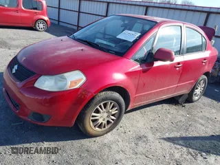 2013 Suzuki SX4 LE with VIN JS2YC5A34D6100952, listed as a IAAI auction lot 41184344 with 1 mi miles. Bid and sale history available at carsss.com. Image 2.