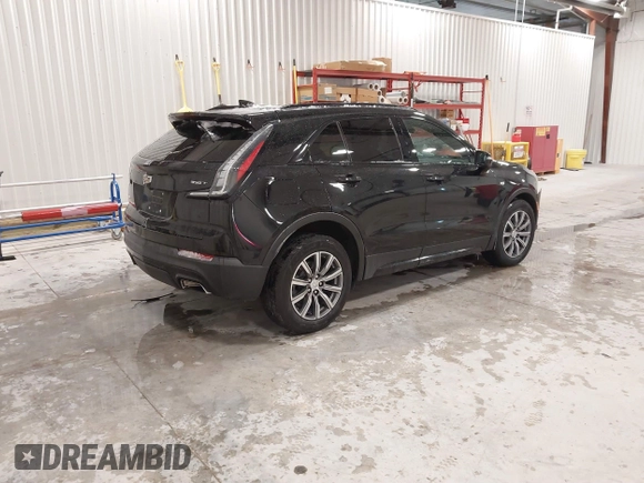 2020 Cadillac XT4 AWD Sport with VIN 1GYFZFR43LF090264, listed as a IAAI auction lot 41261586 with 65,859 mi miles and . Bid and sale history available at DreamBid. Image 4.