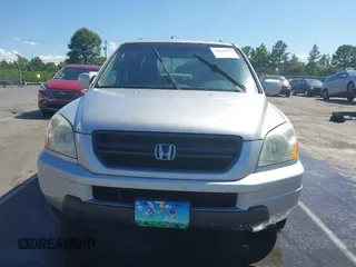 2005 Honda Pilot EX-L z VIN 5FNYF18555B023872, wystawiony jako IAAI lot #42330280 z przebiegiem 143 589 mil mil oraz . Historia ofert i sprzedaży dostępna na DreamBid. Obrazek 12.