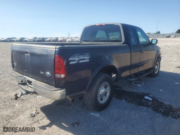 1999 Ford F-150 Work Series with VIN 1FTRX18W9XNA74452, listed as a Copart auction lot 75307294 with 152,631 mi miles and Salvage Title. Bid and sale history available at carsss.com. Image 3.