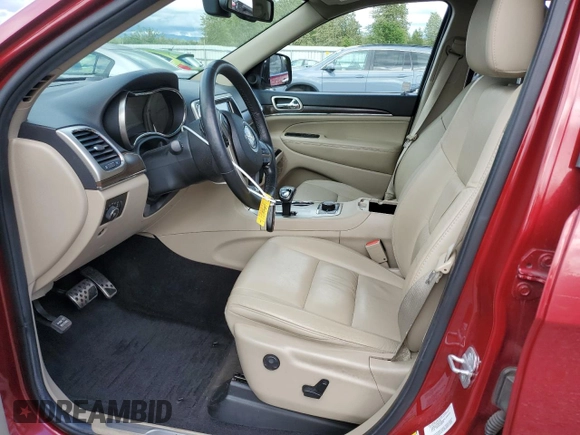 2014 Jeep Grand Cherokee Limited z VIN 1C4RJFBGXEC101022, wystawiony jako Copart lot #57526125 z przebiegiem 124 463 mil mil oraz Szkoda całkowita • Salvage title. Historia ofert i sprzedaży dostępna na DreamBid. Obrazek 7.