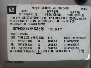 2006 Cadillac Escalade z VIN 1GYEK63N76R136618, wystawiony jako Copart lot #58990945 z przebiegiem Nie podano mil oraz Czysty tytuł • Clean title. Historia ofert i sprzedaży dostępna na DreamBid. Obrazek 13.