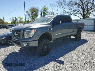 2016 Nissan Titan XD PRO-4X with VIN 1N6BA1F4XGN502921, listed as a Copart auction lot 49748545 with 233,168 mi miles and Clean Title. Bid and sale history available at carsss.com. Image 1.