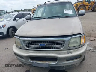 1997 Ford Expedition XLT with VIN 1FMEU1765VLB24163, listed as a IAAI auction lot 42303093 with 137,427 mi miles and . Bid and sale history available at DreamBid. Image 12.