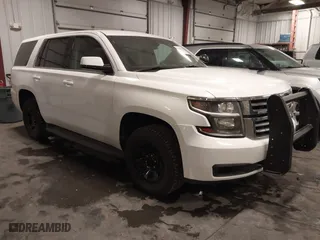 2020 Chevrolet Tahoe Commercial with VIN 1GNSKDECXLR260202, listed as a IAAI auction lot 41608712 with 137,214 mi miles. Bid and sale history available at carsss.com. Image 1.