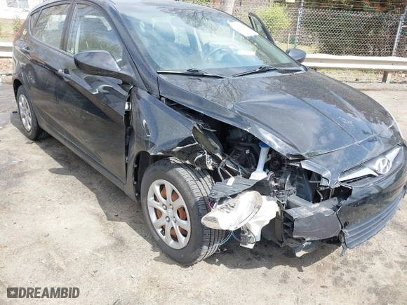 2013 Hyundai Accent GL with VIN KMHCT5AE9DU084356, listed as a IAAI auction lot 41817130 with 114,455 mi miles. Bid and sale history available at carsss.com. Image 6.