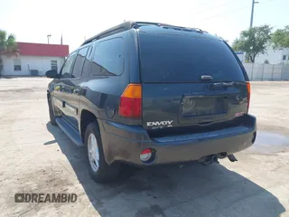 2003 GMC Envoy SLT with VIN 1GKES16S536169306, listed as a IAAI auction lot 42234834 with 239,144 mi miles and . Bid and sale history available at DreamBid. Image 3.