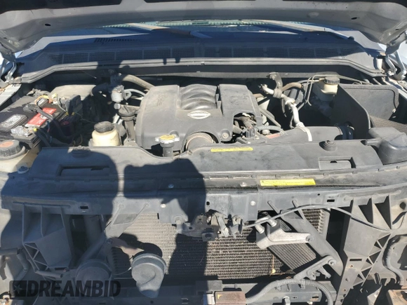 2005 Nissan Titan SE z VIN 1N6AA06AX5N500773, wystawiony jako Copart lot #81695634 z przebiegiem 127 210 mil mil oraz Szkoda całkowita • Salvage title. Historia ofert i sprzedaży dostępna na DreamBid. Obrazek 11.