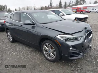 2018 BMW X2 xDrive28i with VIN WBXYJ5C37JEF74740, listed as a IAAI auction lot 41818174 with 74,155 mi miles. Bid and sale history available at carsss.com. Image 1.