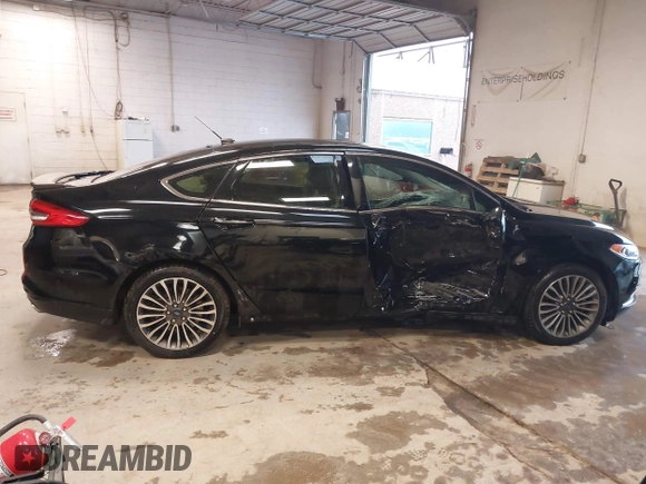 2017 Ford Fusion Titanium с VIN 3FA6P0SU8HR215570, выставлен на аукционе IAAI как лот 41427407 с пробегом 97 281 миль миль и . История ставок и продаж доступна на DreamBid. Изображение 13.
