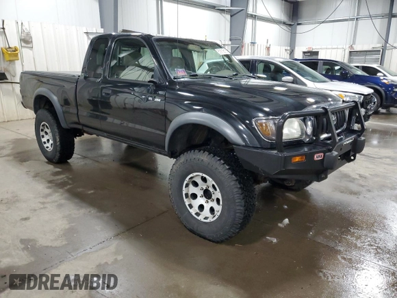 2004 Toyota Tacoma with VIN 5TEWN72N14Z424211, listed as a Copart auction lot 51815615 with 203,415 mi miles and Salvage Title. Bid and sale history available at DreamBid. Image 4.