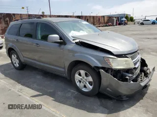2012 Dodge Journey SXT with VIN 3C4PDCBG6CT207952, listed as a Copart auction lot 60334565 with Not provided miles and Salvage title. Bid and sale history available at DreamBid. Image 4.