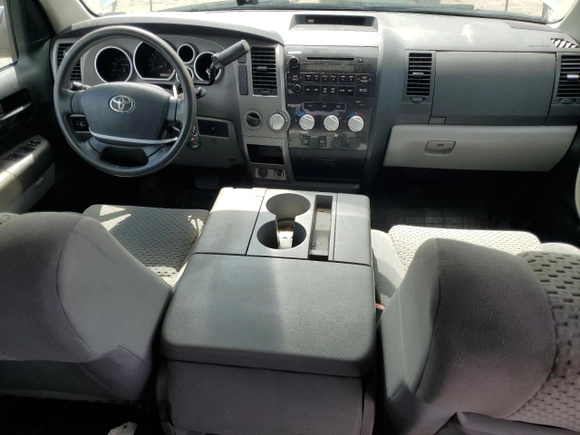 2012 Toyota Tundra 4WD Truck with VIN 5TFCY5F15CX013941, listed as a Copart auction lot 69946754 with 163,228 mi miles and Salvage Title. Bid and sale history available at carsss.com. Image 8.