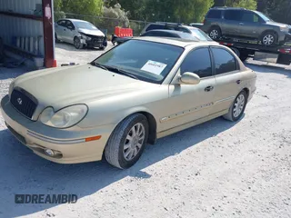 2003 Hyundai Sonata GLS with VIN KMHWF35H03A901839, listed as a IAAI auction lot 40601987 with 171,580 mi miles. Bid and sale history available at carsss.com. Image 2.
