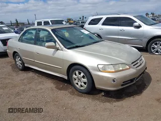 2001 Honda Accord EX z VIN JHMCG66841C010764, wystawiony jako IAAI lot #42266606 z przebiegiem 154 287 mil mil oraz . Historia ofert i sprzedaży dostępna na DreamBid. Obrazek 1.
