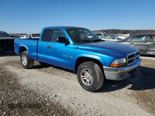 2001 Dodge Dakota SLT with VIN 1B7GG22X01S283618, listed as a Copart auction lot 42608555 with 142,307 mi miles and Salvage Title. Bid and sale history available at DreamBid. Image 4.