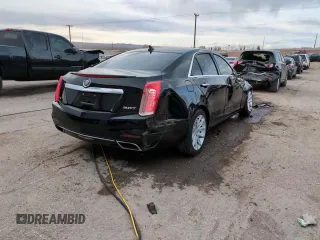 2014 Cadillac CTS RWD z VIN 1G6AP5SX6E0193868, wystawiony jako Copart lot #51795485 z przebiegiem 100 039 mil mil oraz Szkoda całkowita • Salvage title. Historia ofert i sprzedaży dostępna na DreamBid. Obrazek 13.