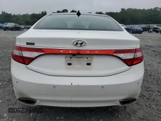 2013 Hyundai Azera z VIN KMHFH4JG2DA277122, wystawiony jako Copart lot #59899755 z przebiegiem 210 601 mil mil oraz Czysty tytuł • Clean title. Historia ofert i sprzedaży dostępna na DreamBid. Obrazek 6.