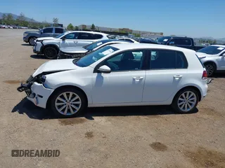 2014 Volkswagen Golf TDI w/Sunroof & Nav z VIN WVWDM7AJ1EW003256, wystawiony jako IAAI lot #42239048 z przebiegiem 66 327 mil mil oraz . Historia ofert i sprzedaży dostępna na DreamBid. Obrazek 15.