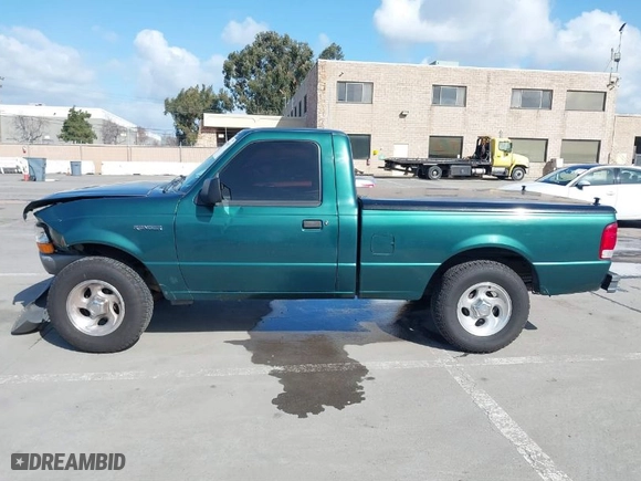 2000 Ford Ranger XL with VIN 1FTYR10C9YPB64651, listed as a IAAI auction lot 41589635 with 134,323 mi miles. Bid and sale history available at carsss.com. Image 14.