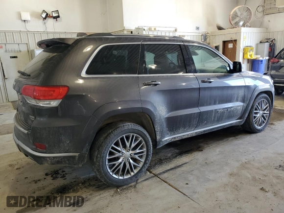 2017 Jeep Grand Cherokee Summit with VIN 1C4RJFJT4HC723876, listed as a Copart auction lot 52647205 with 97,412 mi miles and Salvage title. Bid and sale history available at DreamBid. Image 3.