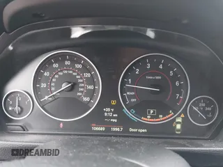 2013 BMW 3 Series 328i with VIN WBA3C1G59DNR47877, listed as a IAAI auction lot 41640493 with 106,689 mi miles and . Bid and sale history available at DreamBid. Image 7.