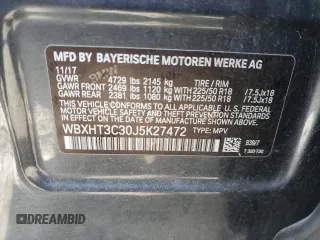 2018 BMW X1 xDrive28i with VIN WBXHT3C30J5K27472, listed as a Copart auction lot 52106655 with 120,936 mi miles and Clean Title. Bid and sale history available at carsss.com. Image 13.