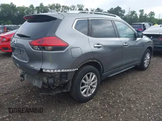 2017 Nissan Rogue S with VIN KNMAT2MV2HP581419, listed as a IAAI auction lot 42671858 with 121,308 mi miles and . Bid and sale history available at DreamBid. Image 4.