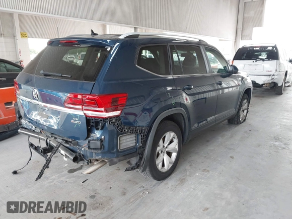 2019 Volkswagen Atlas SE with VIN 1V2LR2CAXKC605369, listed as a IAAI auction lot 39617117 with 74,432 mi miles and . Bid and sale history available at DreamBid. Image 4.