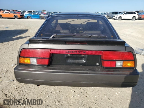 1986 Nissan 300ZX z VIN JN1HZ16S9GX094097, wystawiony jako Copart lot #75251134 z przebiegiem Nie podano mil oraz Szkoda całkowita • Salvage title. Historia ofert i sprzedaży dostępna na DreamBid. Obrazek 6.