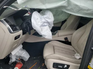 2021 BMW X5 xDrive40i с VIN 5UXCR6C06M9F58049, выставлен на аукционе Copart как лот 57863685 с пробегом Не указан миль и Списание • Salvage title. История ставок и продаж доступна на DreamBid. Изображение 7.