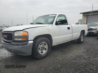 2000 GMC Sierra 1500 SL with VIN 1GTEC14W2YE335809, listed as a Copart auction lot 77331524 with 173,123 mi miles and Salvage Title. Bid and sale history available at DreamBid. Image 1.