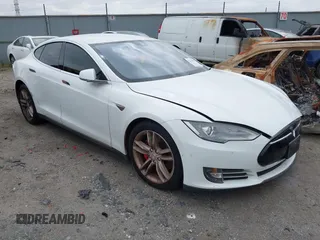 2016 Tesla Model S 90D with VIN 5YJSA1E40GF123543, listed as a IAAI auction lot 42111603 with 126,445 mi miles and . Bid and sale history available at DreamBid. Image 1.