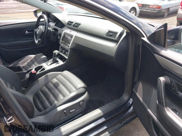 2011 Volkswagen CC Sport with VIN WVWMP7AN8BE709541, listed as a IAAI auction lot 42164892 with 154,547 mi miles. Bid and sale history available at carsss.com. Image 5.