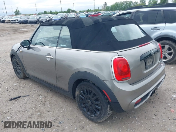 2017 MINI Convertible Cooper S with VIN WMWWG9C34H3C81035, listed as a IAAI auction lot 42216900 with 61,996 mi miles and . Bid and sale history available at DreamBid. Image 3.