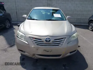 2007 Toyota Camry CE with VIN 4T1BE46KX7U716414, listed as a IAAI auction lot 42116250 with 104,298 mi miles and . Bid and sale history available at DreamBid. Image 12.