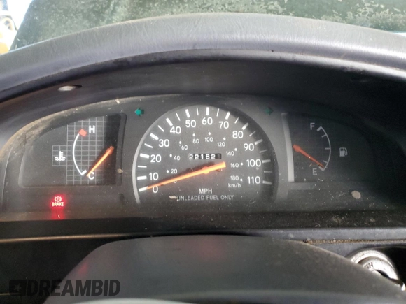 1999 Toyota Tacoma z VIN 4TANL42N6XZ561222, wystawiony jako Copart lot #45721925 z przebiegiem 221 521 mil mil oraz Szkoda całkowita • Salvage title. Historia ofert i sprzedaży dostępna na DreamBid. Obrazek 9.