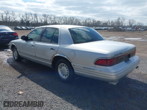 1997 Mercury Grand Marquis LS with VIN 2MELM75W3VX717801, listed as a IAAI auction lot 41920075 with 173,730 mi miles and . Bid and sale history available at DreamBid. Image 3.