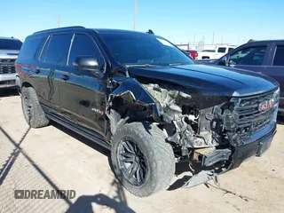 2021 GMC Yukon AT4 with VIN 1GKS2CKD2MR169740, listed as a IAAI auction lot 41472470 with 103,662 mi miles. Bid and sale history available at carsss.com. Image 1.