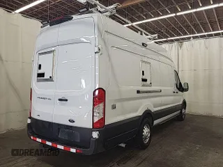 2023 Ford Transit Cargo with VIN 1FTBW3U84PKB20116, listed as a IAAI auction lot 42748031 with 6,591 mi miles and . Bid and sale history available at DreamBid. Image 7.