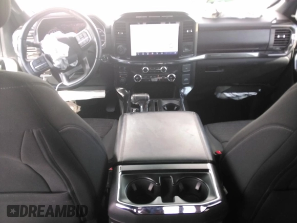 2021 Ford F-150 XL with VIN 1FTFW1E59MFA70313, listed as a Copart auction lot 60793215 with 52,387 mi miles and Salvage title. Bid and sale history available at DreamBid. Image 8.