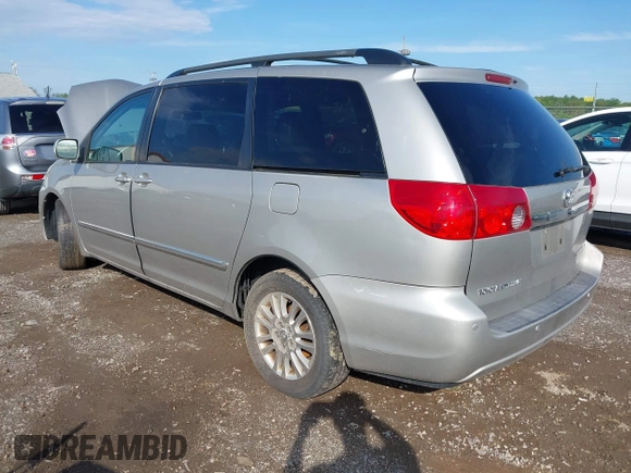 2008 Toyota Sienna XLE with VIN 5TDZK22C58S221834, listed as a IAAI auction lot 42183708 with 216,718 mi miles and . Bid and sale history available at DreamBid. Image 3.