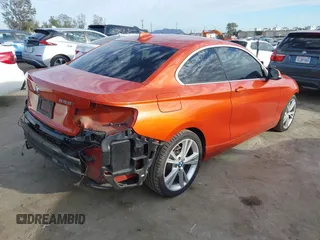2015 BMW 2 Series 228i with VIN WBA1F9C56FVW98461, listed as a IAAI auction lot 41663193 with 94,584 mi miles. Bid and sale history available at carsss.com. Image 4.